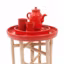 Rouge passion pour cette table d'appoint très fonctionnelle