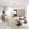 Harmonie de beige pour le modèle " Lucrezia ", avec coin repas intégré façon comptoir. Finition laquée " soie ".