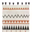 Ambiance ethnique et géométrique pour le tapis tissé