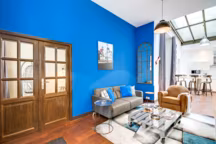 Fauteuil club Zago, tableau Arteum, miroir Hanjel.