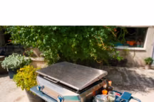 Plancha à gaz master series ex. Surface de cuisson en fonte émaillée. Prix : 390 euros, Campingaz