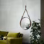 Un miroir cerclé de cuir chez Design Ikonik