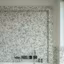 Une salle de bains en total look terrazzo