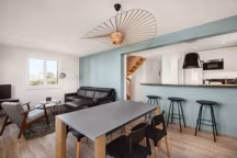 L'ouverture d'une partie du mur a permis d'ouvrir la cuisine sur le séjour/salle à manger.