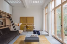 De l’ombre à la lumière : la métamorphose d’un ancien entrepôt en refuge design.