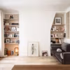 13 idées de pros pour aménager une bibliothèque dans un salon.